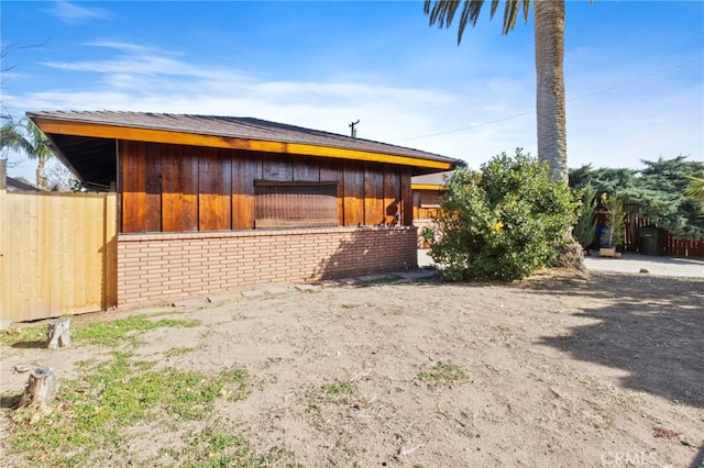 exterior space with an outbuilding