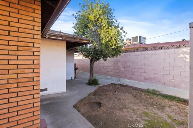 view of yard featuring central AC