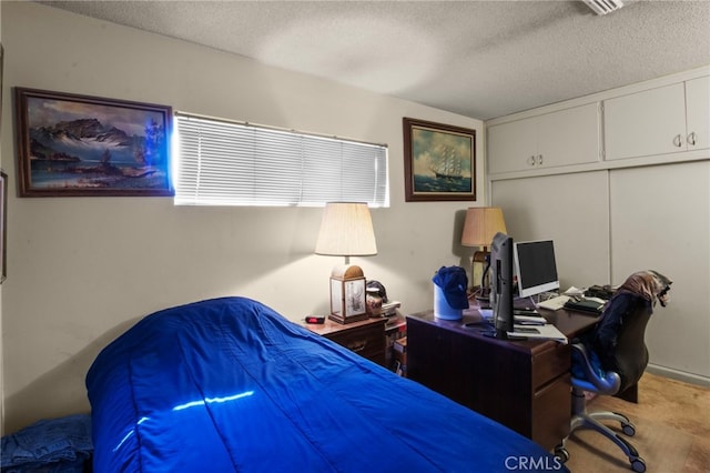 bedroom with a textured ceiling