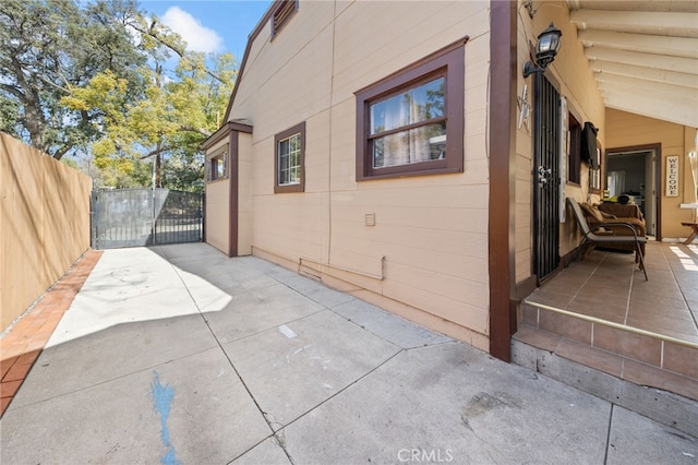 view of property exterior featuring a patio