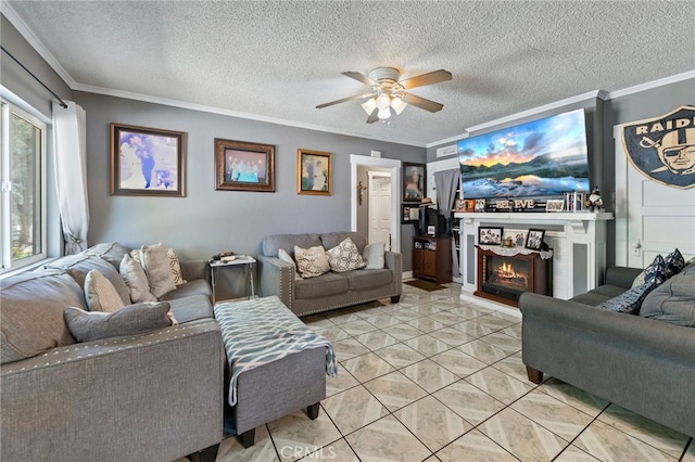 tiled living room featuring ornamental molding, a textured ceiling, and ceiling fan