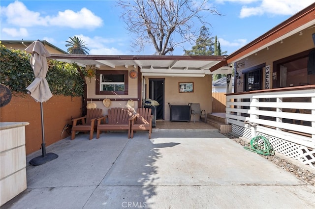 rear view of property with a patio area