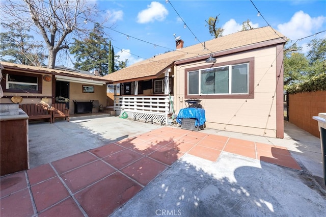 back of property featuring a patio area