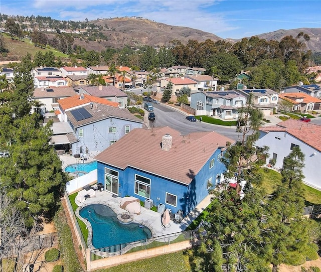 5761 John Bixby Ln, Yorba Linda, CA 92887 - aerial view of residential area featuring a pool and a mountain backdrop