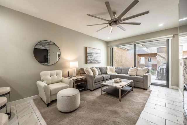 living room with ceiling fan