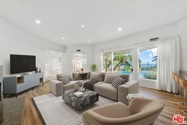 living room with light hardwood / wood-style floors