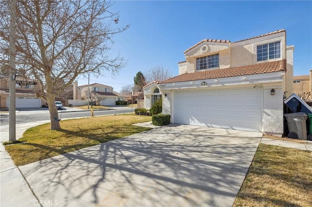 view of front facade featuring a garage and a front yard