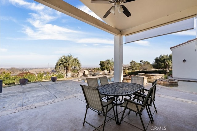 view of patio with ceiling fan