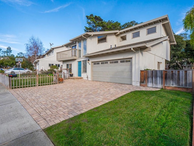 front facade featuring a garage, a balcony, and a front lawn