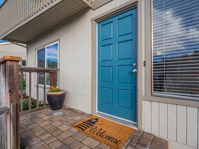 doorway to property featuring a balcony