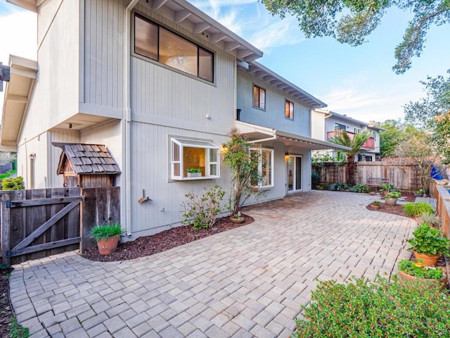 back of house featuring a patio area