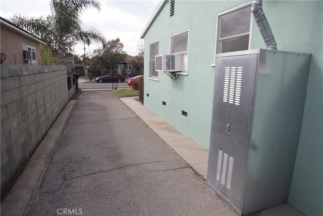 view of home's exterior with cooling unit