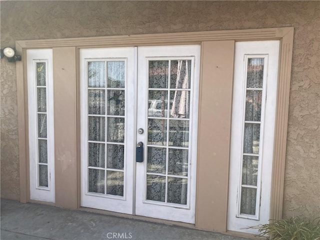 doorway to outside with french doors