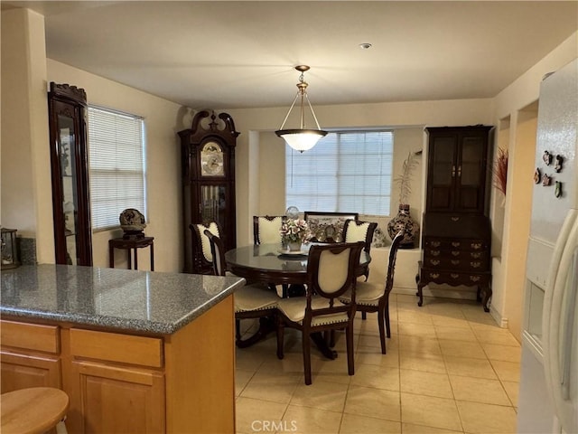 dining room with light tile patterned floors