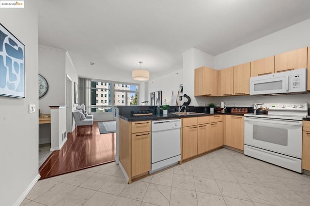 kitchen featuring crown molding, hanging light fixtures, light brown cabinets, kitchen peninsula, and white appliances