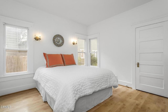 bedroom featuring light wood-type flooring