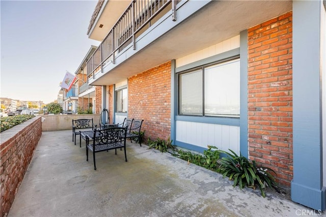 view of patio featuring outdoor dining space