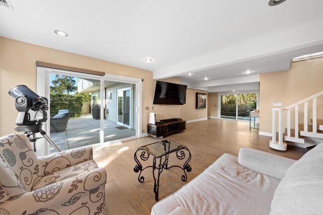 6130 Terryhill Dr, La Jolla, CA 92037 - living room featuring wood finished floors, stairway, recessed lighting, and baseboards