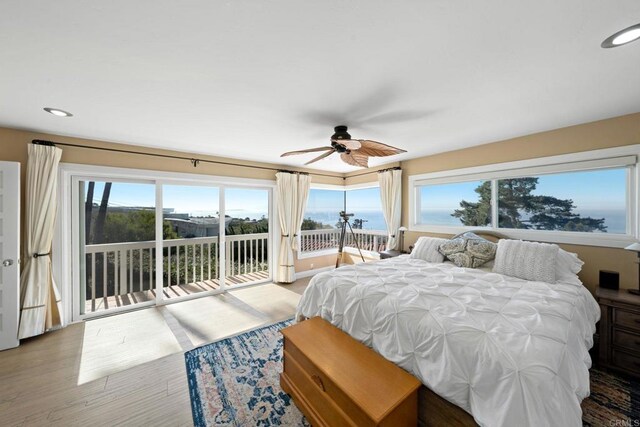 6130 Terryhill Dr, La Jolla, CA 92037 - bedroom featuring access to exterior, multiple windows, recessed lighting, wood finished floors, and a ceiling fan