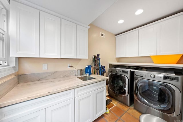 6130 Terryhill Dr, La Jolla, CA 92037 - clothes washing area featuring washer and dryer, recessed lighting, cabinet space, and light tile patterned floors