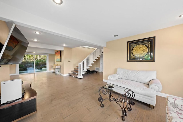 6130 Terryhill Dr, La Jolla, CA 92037 - living room featuring stairs, baseboards, wood finished floors, and recessed lighting
