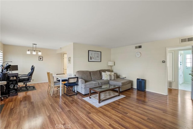 living room with hardwood / wood-style floors