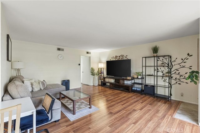 living room with hardwood / wood-style floors