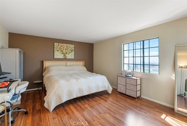 bedroom featuring hardwood / wood-style floors