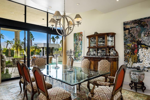 dining area featuring an inviting chandelier