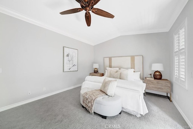 carpeted bedroom with ceiling fan and lofted ceiling