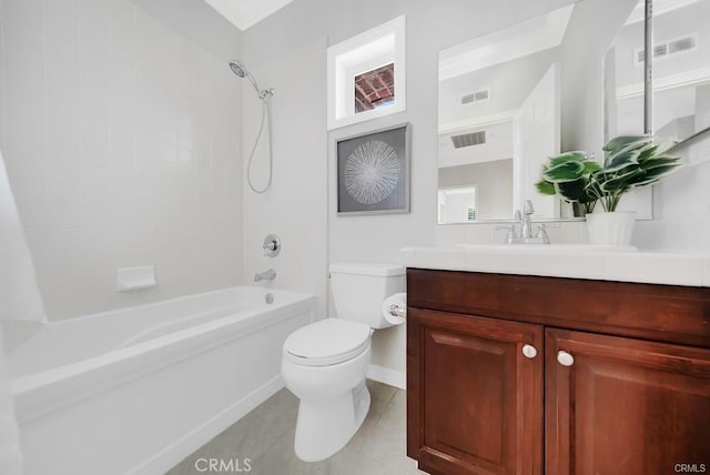 full bathroom with vanity, tile patterned flooring, tiled shower / bath combo, and toilet