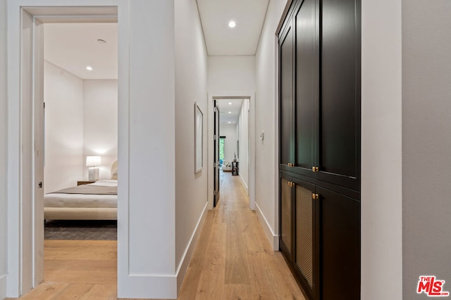 hall featuring light wood-type flooring