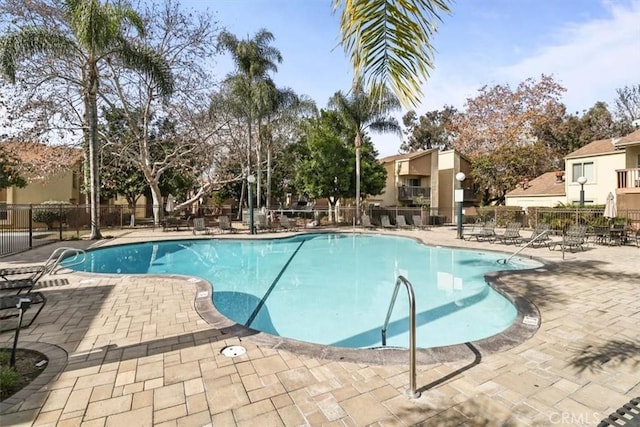 view of pool featuring a patio area