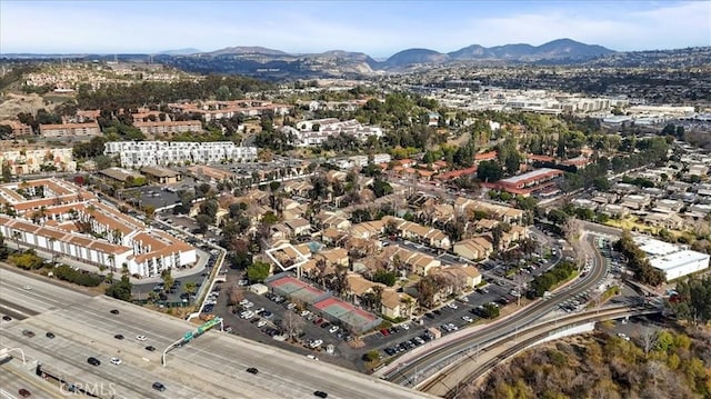 drone / aerial view featuring a mountain view