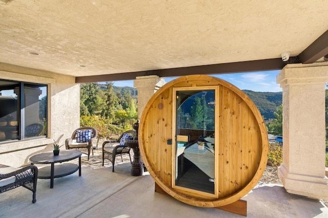 view of patio featuring a mountain view