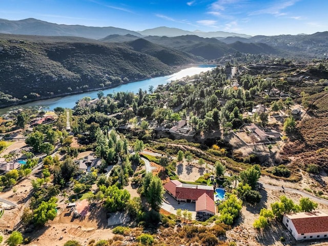 aerial view with a water and mountain view