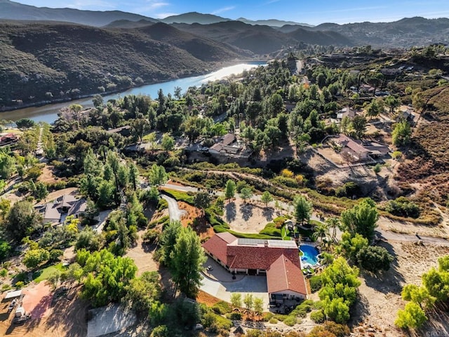 bird's eye view featuring a water and mountain view