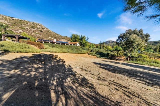 exterior space featuring a mountain view