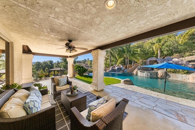 view of patio with a gazebo, pool water feature, an outdoor living space, and ceiling fan