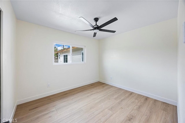 unfurnished room featuring ceiling fan and light hardwood / wood-style floors