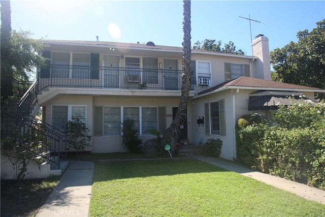 exterior space with a front yard