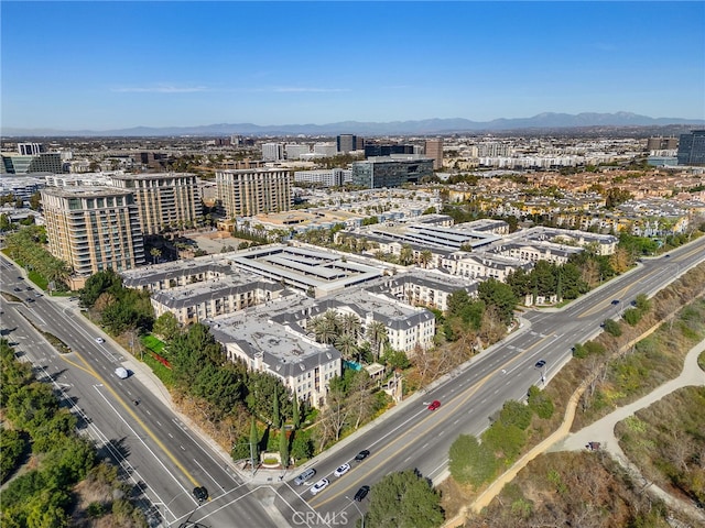 drone / aerial view featuring a mountain view