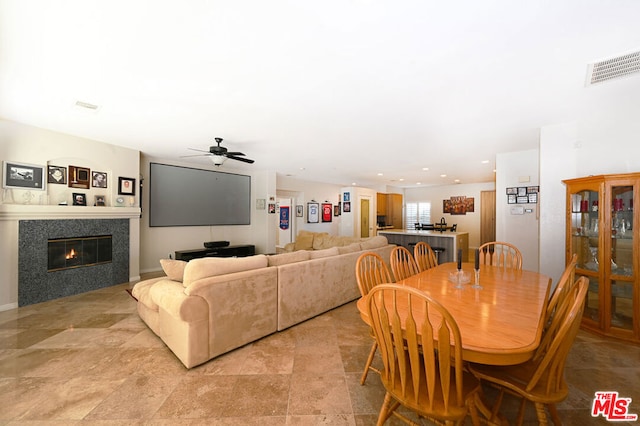 dining space featuring ceiling fan