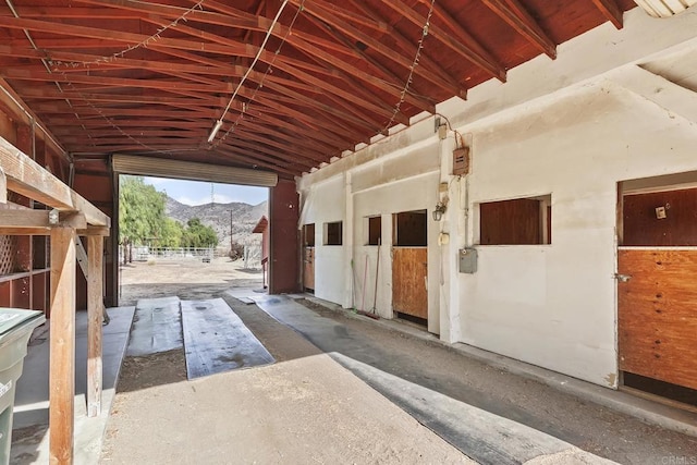 view of stable with a mountain view