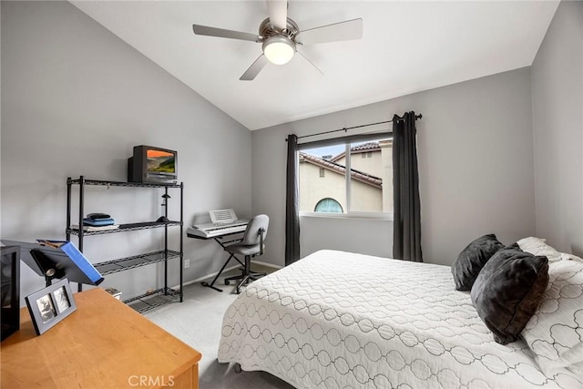 bedroom featuring carpet, lofted ceiling, and ceiling fan