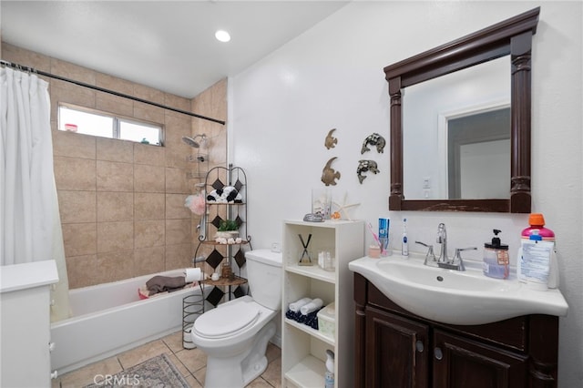 full bathroom with tile patterned flooring, vanity, shower / bath combo, and toilet