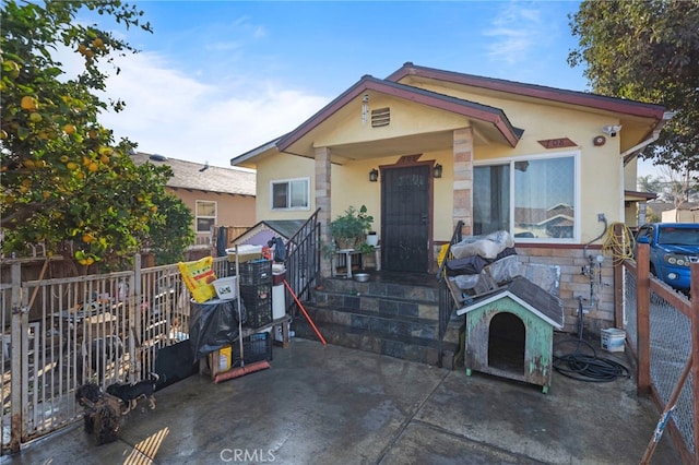 view of front of house with a patio