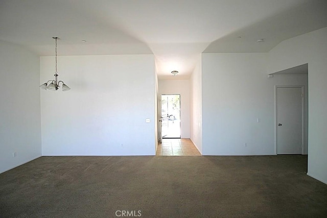 913 Wren Ct, Barstow, CA 92311 - unfurnished room with a chandelier and light carpet