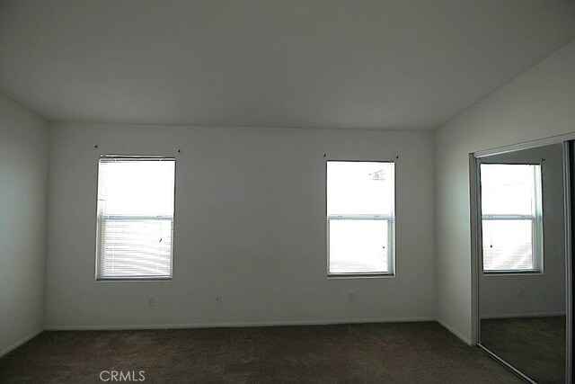 913 Wren Ct, Barstow, CA 92311 - carpeted empty room with baseboards