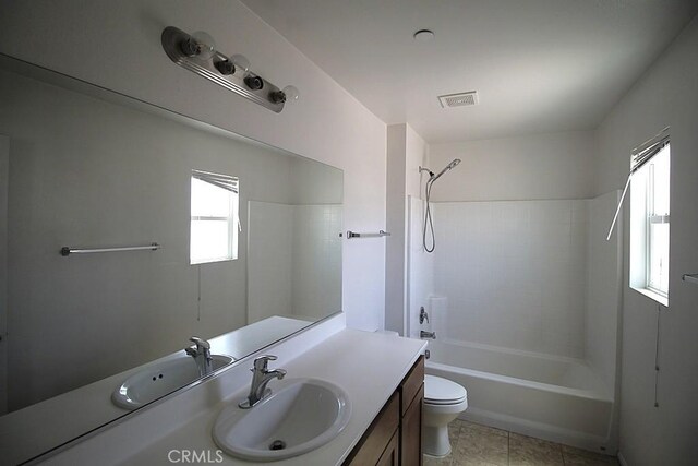 913 Wren Ct, Barstow, CA 92311 - bathroom featuring toilet, vanity, bathing tub / shower combination, and tile patterned floors